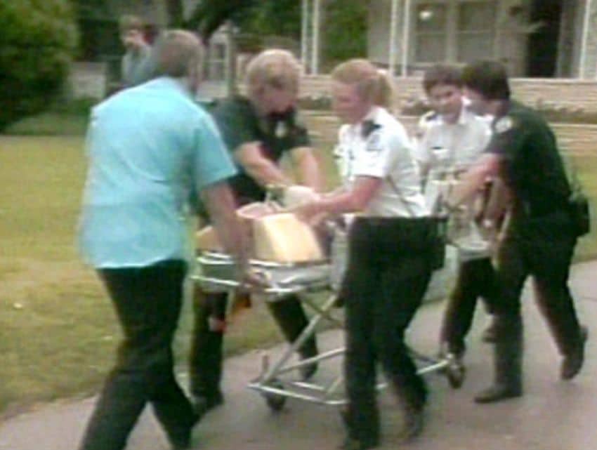 Vicki Wegerle being removed from her house shortly after the attack