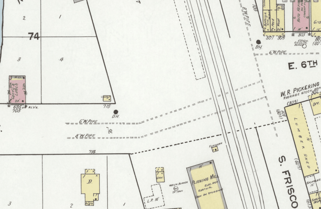 Historical map showing buildings, streets, and infrastructure layout with labels and designated areas.